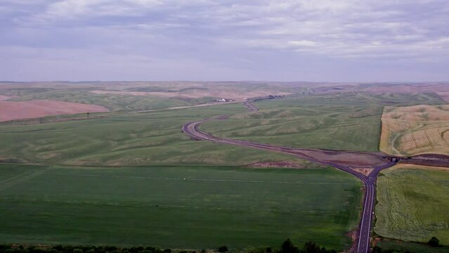 A drone landscape panorama of wheat fields in the Palouse region of Eastern Washington 4K 60FPS