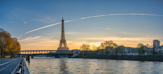 Fototapeta na wymiar Paris France, panorama sunrise city skyline at Eiffel Tower and Seine River Bir-Hakeim Bridge