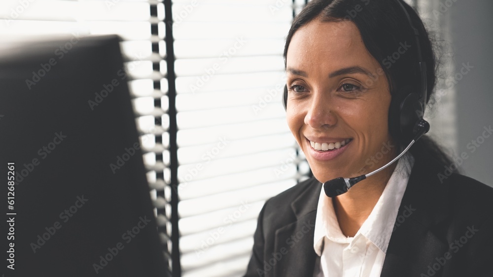 Aufkleber competent female operator working on computer and talking with clients. concept relevant to both cal