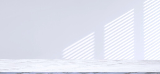 Obraz premium Panoramic view of empty White Marble Counter with light and venetian blinds shadow on white wall background, suitable for product Display Presentation