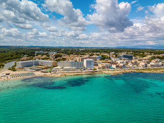 Fototapeta na wymiar Cityscape and beach drone landscape panorama Can Picafort, Balearic Islands Mallorca Spain. Vacation concept.