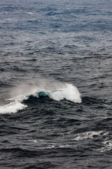Fototapeta premium Waves ocean spray tides stormy day on Atlantic Ocean during transatlantic crossing on legendary ocean liner