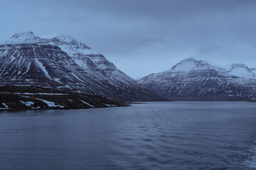 Breathtaking glacial mountain coastline scenery in Iceland seen from cruiseship cruise ship liner...