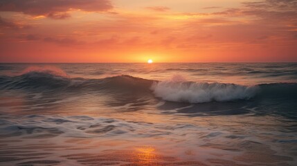 Fototapeta na wymiar The photo captures a breathtaking sunset over the sea, painting the sky in a mesmerizing palette of warm hues. The golden sun descends towards the horizon, casting a radiant glow across the tranquil w