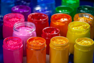 Colors for fabric printing in different colors in clear glass bottles. .Clear glass bottle allows...