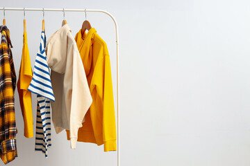 Obraz premium Wardrobe rack with different clothes, concept of different clothes