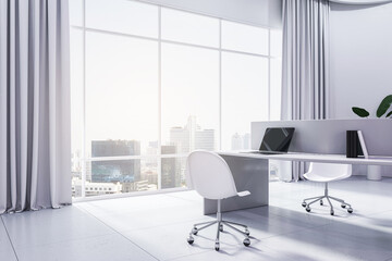 Great city view background from big window in sunlit coworking office with light walls and floor, white chairs and modern laptops on cozy tables. 3D rendering