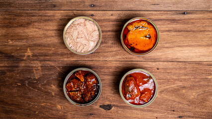 Fototapeta premium Canned food top view photo, Cans with pull-out ring, metal packaging.