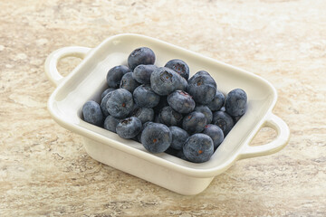 Sweet ripe blueberry heap in the bowl