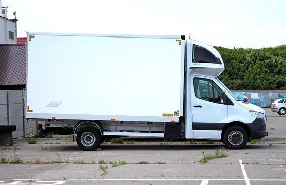 Vinnytsia, Ukraine; June 10, 2023. White Mercedes-Benz Sprinter Luton Box Cargo Van with roof sleeper at the parking. Sleeper on top of truck. Sleeping cabin truck. Roof sleeper for box truck.