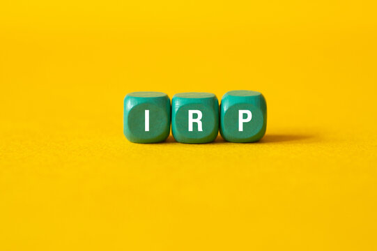 Irp - Integrated Resource Plan, word concept on building blocks, text