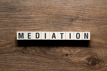Mediation - word concept on building blocks, text