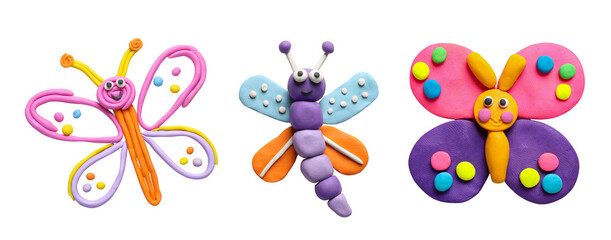 Set with different colorful plasticine butterflies on white background, top view