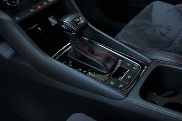 Fototapeta na wymiar Automatic gearbox shift lever. Close up of the automatic transmission shift lever with luxury.