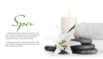 Obraz na płótnie Canvas Composition with spa stones and lily flower on white background. Banner design with space for text