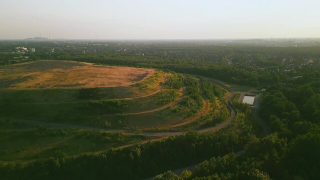 Aerial scenic view of slagheap landscape near old coal mine, drone footage.