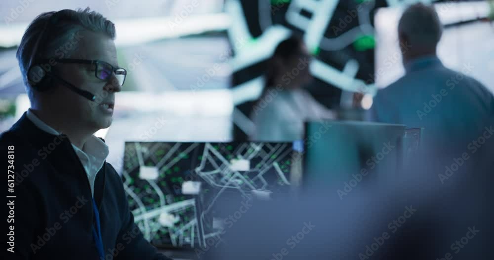 Poster High-Tech Surveillance Office with Specialists Using Satellite Technology with Real-Time Monitoring, CCTV and Traffic Reports. Monitoring Room Technical Support Specialist on a Call with Team Manager