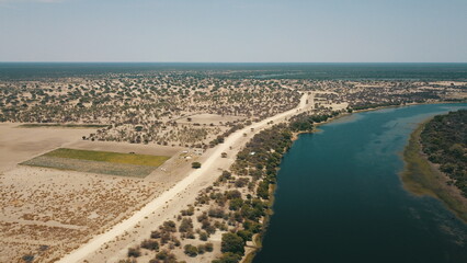 Fototapeta na wymiar Boteti river as it meanders through the village of Makalamabedi, Botswana, Africa