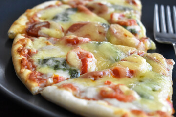 Homemade pizza on a plate. 