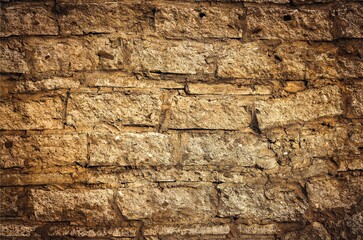 Old stone and brick texture. Wall background in vintage style.