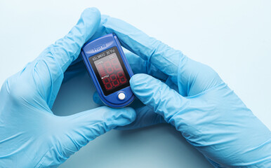Pulse oximeter in doctor hand