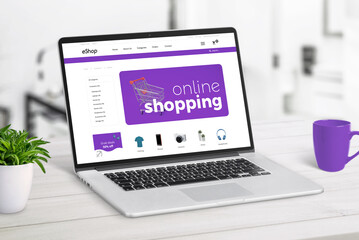 Online shop on laptop screen concept. Modern ecommerce page with products and shopping cart