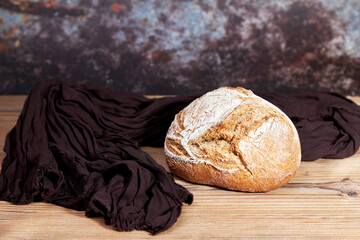 Golden loaf of bread on a table