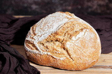 Golden loaf of bread on a table