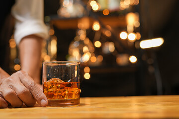 Bartender pouring Whiskey, on  bar,