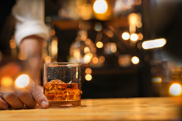 Bartender pouring Whiskey, on  bar,
