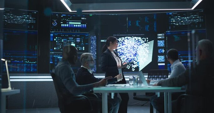 Diverse Team Of Data Scientists and Software Developers Discussing an AI Project in a Room with Neural Network Model on a Digital Screen. Female Leading Artificial Intelligence Company Board Meeting