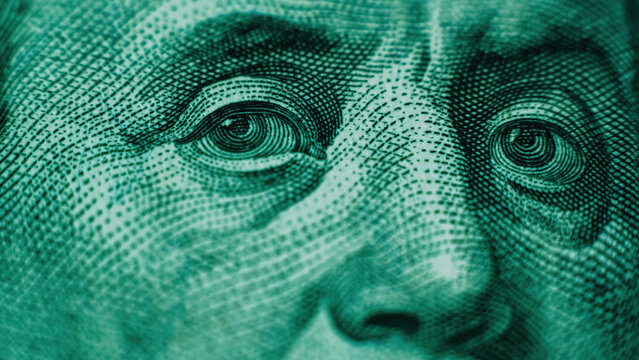 Benjamin Franklin portrait. Financial independence. Money success. Hundred US dollar bill. United States national currency banknote fragment.
