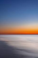 Abstract view of the sunset at the beach on Juist, East Frisian Islands, Germany.