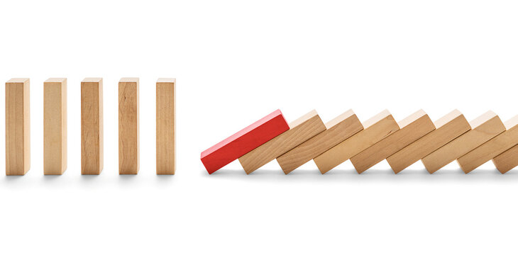 Weak link -Concept domino effect, the red wooden block knocked down the blocks in a row. Wooden blocks on white background, including clipping path
