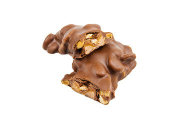 Chocolate bar with peanuts cut in half on a white background