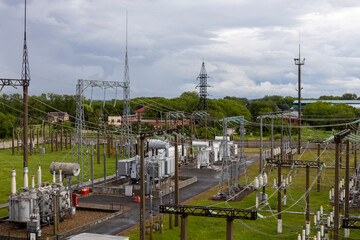 Top view of the electrical substation. Substation with transformers, insulators and switches distributing high voltage.