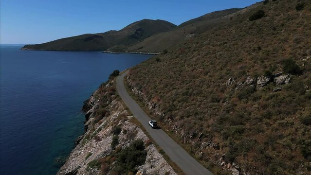 Scenic Coastal Road Trip Through a Mediterranean Bay &ndash; Car Driving Along Winding Seaside Roads