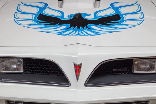 Front view of a classic white 1977 Pontiac Firebird 6.6 FW 87 Trans Am in Drempt, The Netherlands on May 25, 2023