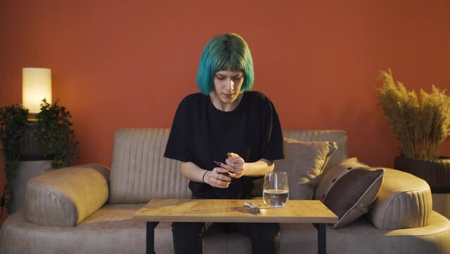 The young woman who wants to commit suicide by taking pills.