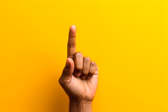 index finger on yellow background have an idea generative ai