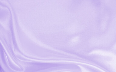 Smooth elegant lilac silk or satin texture as wedding background. Luxurious valentine day background design