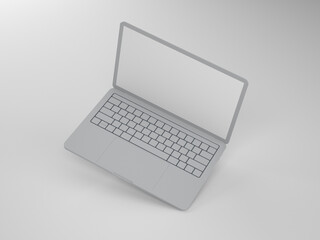 A thin gray laptop on a light background