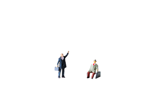 miniature model of businessman isolated on white background.
