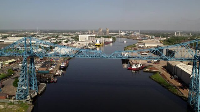 Drone rises above Transporter Bridge to reveal industrial landscape around Middlesbrough 