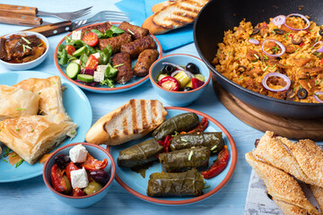 Traditional greek food on a blue wooden background