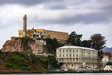 Photograph of the island and the federal prison of Alcatraz in the middle of the San Francisco Bay...