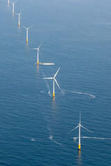 Vertical view of offshore wind farm with wind turbines on the North Sea