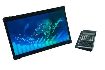 tablet z wyświetlonymi danymi w postaci wykresów, kalkulator, - obrazy, fototapety, plakaty