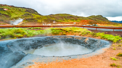 Krysuvik, Seltun, Iceland. Panoramic over geothermal area Krysuvik, Seltun and big boiling cavity filled with hot mud