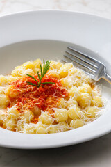 gnocchi with tomato sauce and parmesan cheese